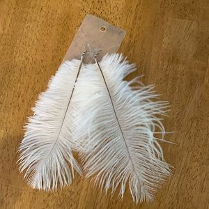 Feather white earrings. Very light.